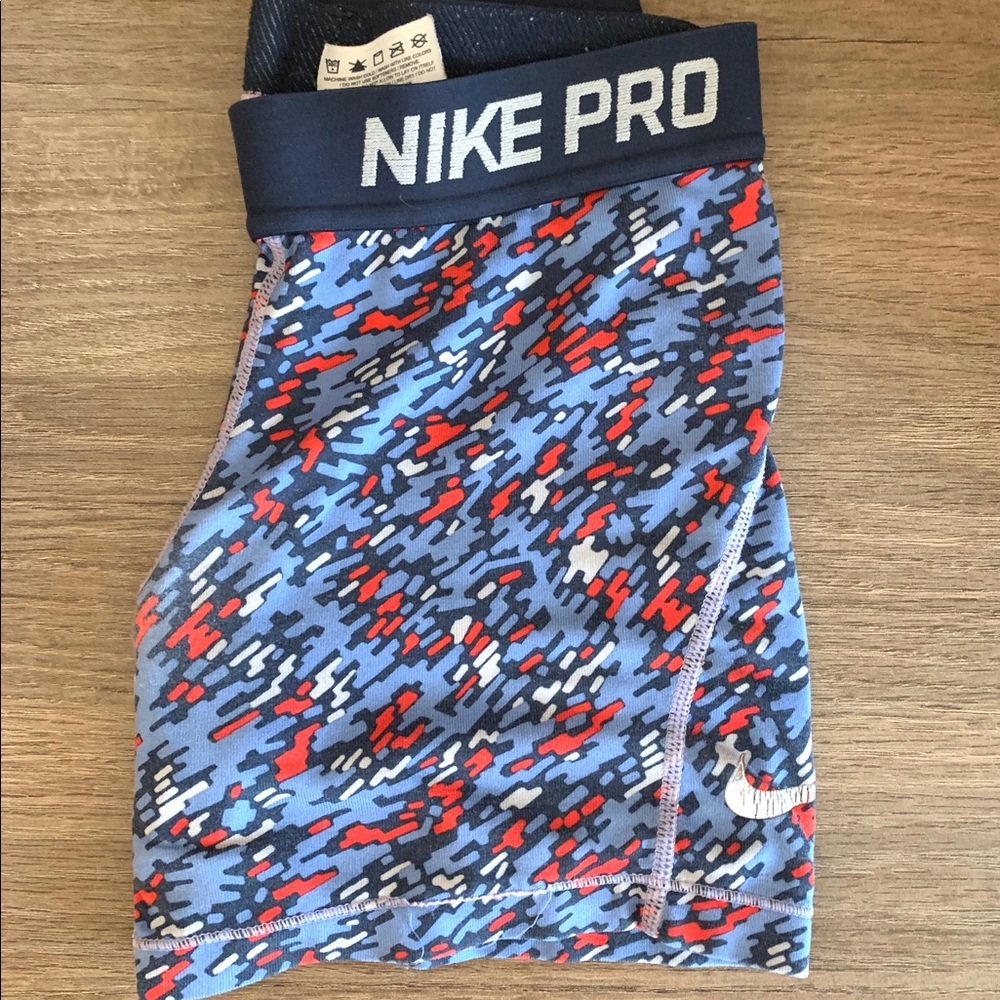 RED WHITE AND BLUE NIKE PROS
